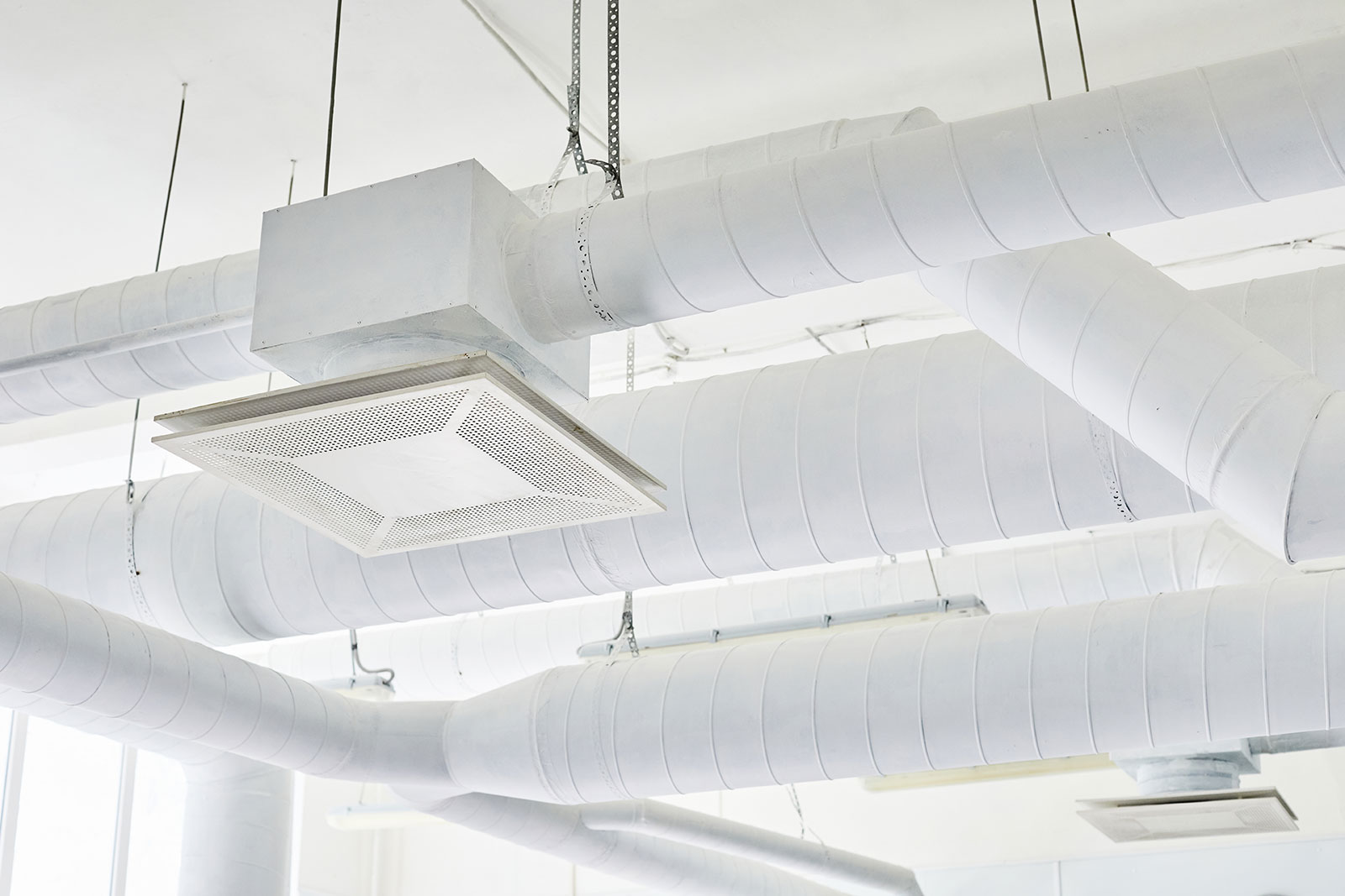 ventilation-system-consisting-white-pipes-ceiling-plant.jpg